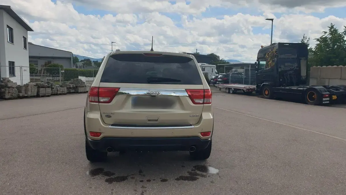 Gebraucht Jeep Grand Cherokee Overland 241 PS (177 kW) 2011 Gold SUV