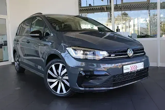 Gebraucht VW Touran Highline 150 PS (110 kW) 2024 Grau (delfingrau metallic) Van / Kleinbus