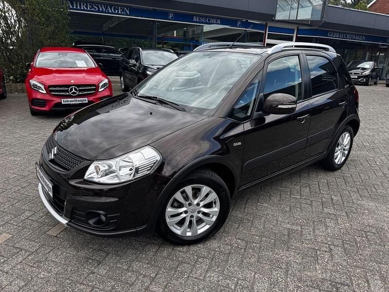 Braun Gebraucht 2013 Suzuki SX4 Style Limousine | 8.990 € (Etwas zu teuer) - Bild 1/4