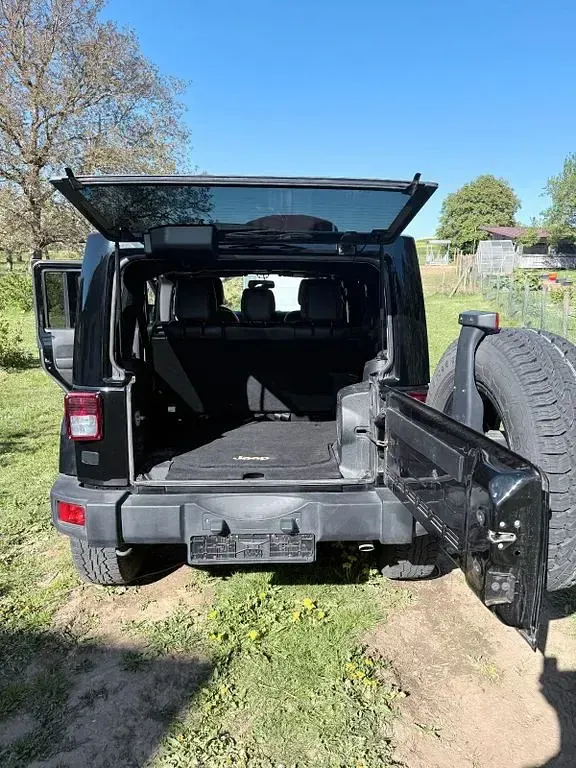 Gebraucht Jeep Wrangler Unlimited 200 PS (147 kW) 2014 Schwarz SUV