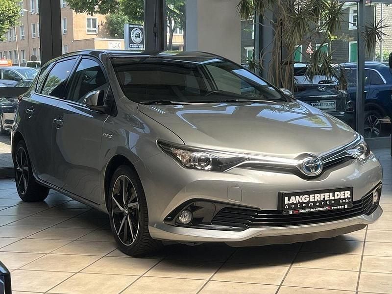 Silber Gebraucht 2017 Toyota Auris Hybrid Edition-S Limousine | 14.999 € (Fairer Preis) - Bild 1/4