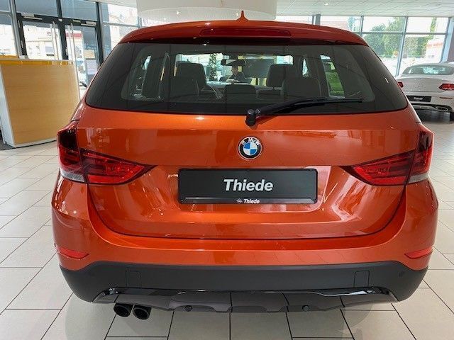 Gebraucht BMW X1 Shadowline 184 PS (135 kW) 2014 Valencia orange metallic SUV