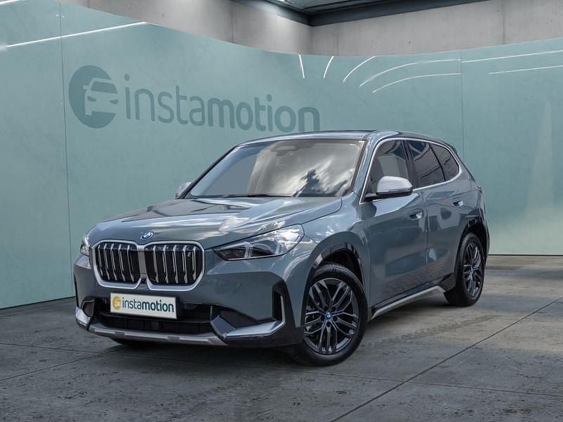 Grün Gebraucht 2023 BMW iX1 SUV | 40.249 € (Guter Preis) - Bild 1/4