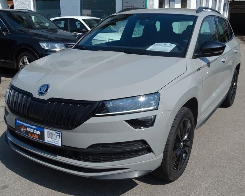 Steelgrau Gebraucht 2020 Skoda Karoq SportLine SUV | 23.999 € (Guter Preis) - Bild 1/4