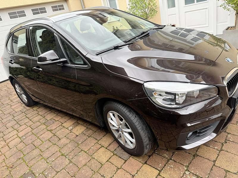 Gebraucht BMW 218 Active Tourer 136 PS (100 kW) 2015 Braun Van / Kleinbus
