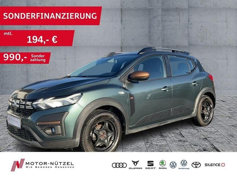 Grün Gebraucht 2023 Dacia Sandero Limousine | 14.840 € (Fairer Preis) - Bild 1/4