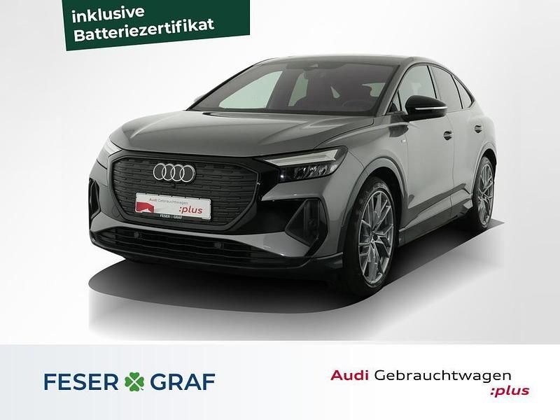 Taifungrau metallic Gebraucht 2022 Audi Q4 Sportback e-tron Ambiente SUV | 35.788 € (Fairer Preis) - Bild 1/4