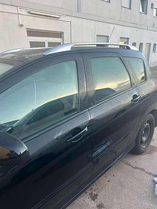 Gebraucht Peugeot 308 SW Family 150 PS (110 kW) 2012 Schwarz Kombi