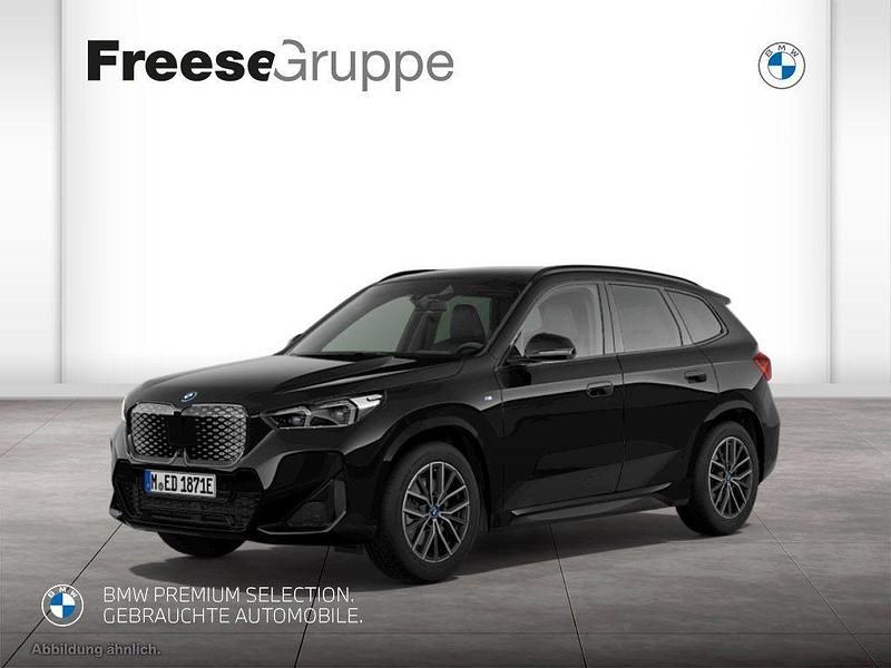 Schwarz Gebraucht 2024 BMW iX1 Comfort Edition SUV | 47.790 € (Fairer Preis) - Bild 1/4