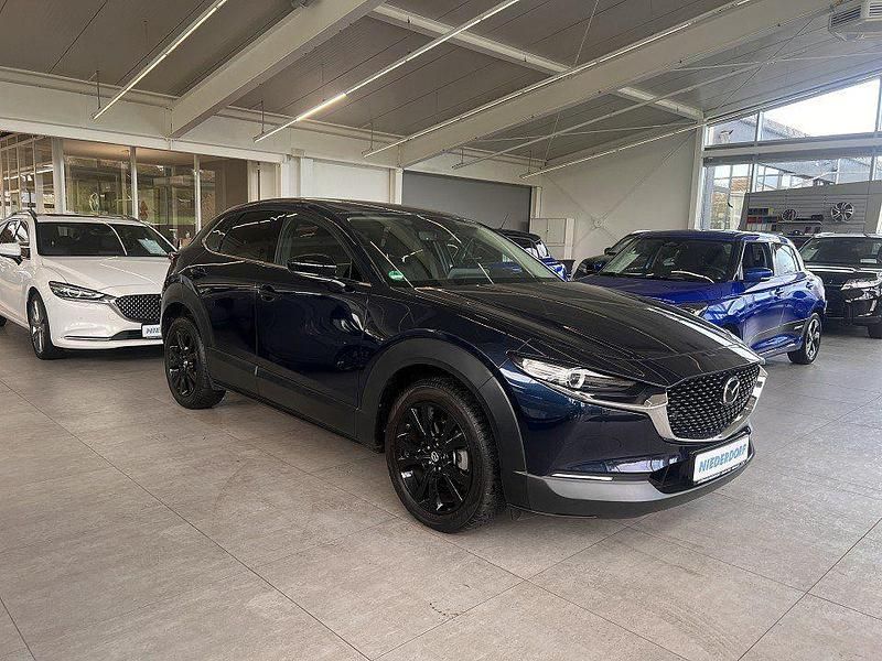 Deep crystal blue (metallic) Gebraucht 2023 Mazda CX-30 Homura-Line SUV | 26.800 € (Fairer Preis) - Bild 1/4