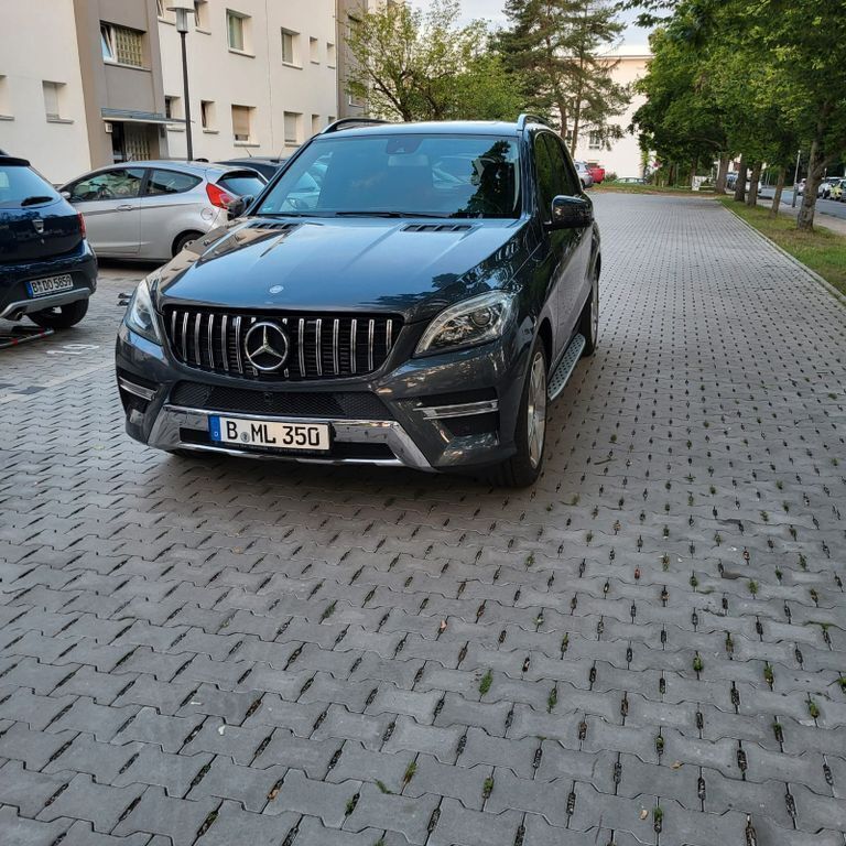 Grau Gebraucht 2013 Mercedes ML350 SUV | 17.099 € (Fairer Preis) - Bild 1/4