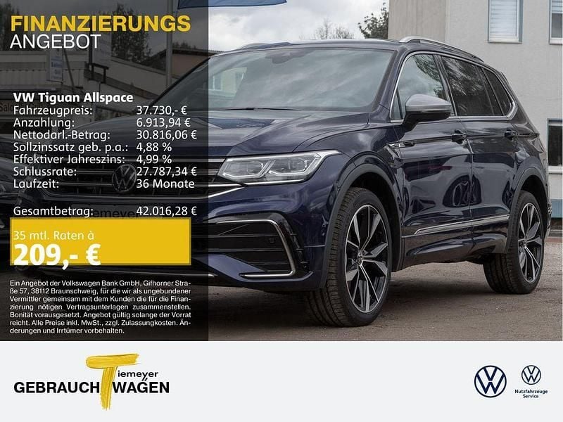 Atlantic blue metallic Gebraucht 2024 VW Tiguan Allspace R-line SUV | 37.730 € (Fairer Preis) - Bild 1/4