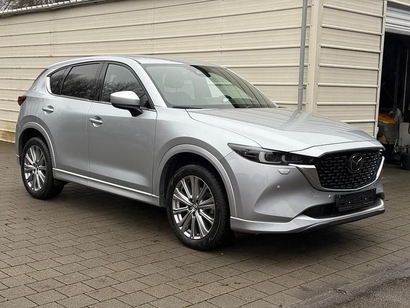 Sonic silver Gebraucht 2023 Mazda CX-5 Takumi-Line SUV | 30.470 € (Superpreis) - Bild 1/4