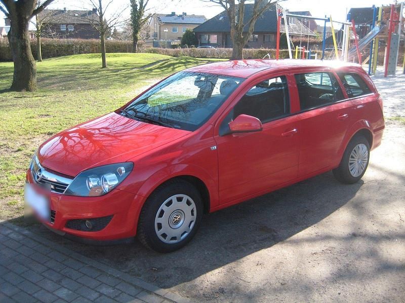 Second-hand Opel Astra 116 CP (85 kW) 2012 Roșu Break