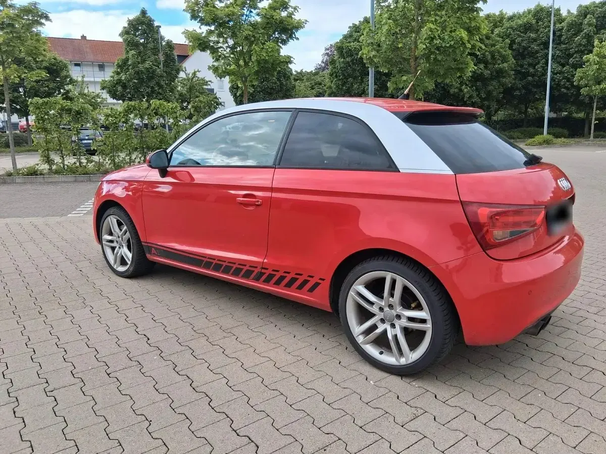 Używany Audi A1 Design 150 KM (110 kW) 2011 Czerwony Hatchback