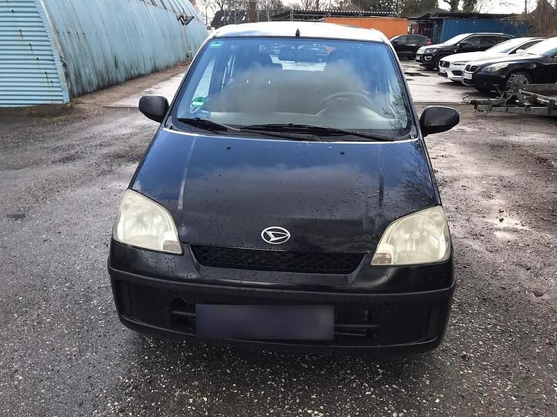 Gebraucht Daihatsu Cuore 58 PS (42 kW) 2004 Schwarz Kleinwagen