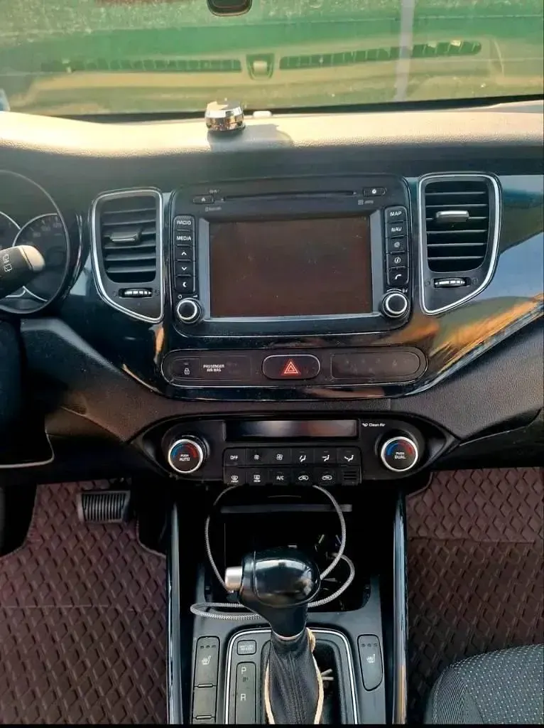 Używany Kia Carens 2016 Brązowy Minivan