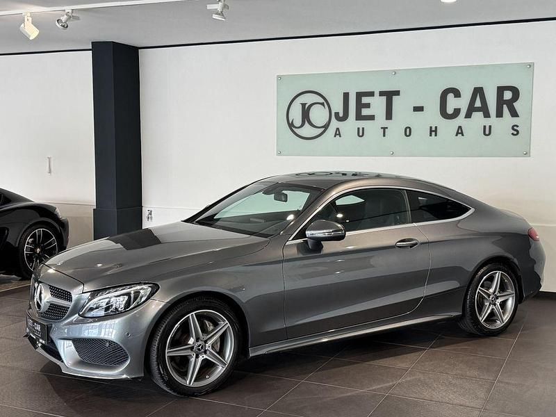 Grau Gebraucht 2017 Mercedes C180 AMG line Coupé | 22.900 € (Fairer Preis) - Bild 1/4