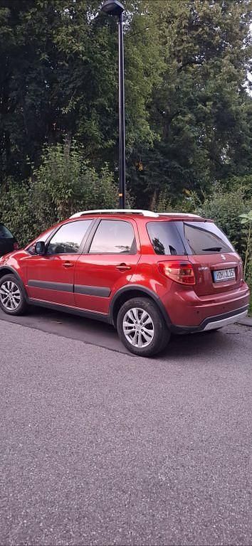 Orange Gebraucht 2013 Suzuki SX4 Style Limousine | 11.000 € (Teuer) - Bild 1/2