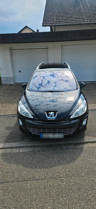 Gebraucht Peugeot 308 120 PS (88 kW) 2010 Schwarz Kombi