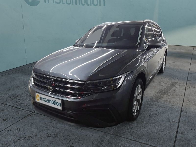 Grau Gebraucht 2024 VW Tiguan Allspace Life SUV | 39.056 € (Fairer Preis) - Bild 1/3