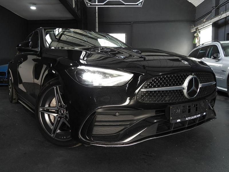Schwarz Gebraucht 2022 Mercedes C220 AMG line Limousine | 33.500 € - Bild 1/4