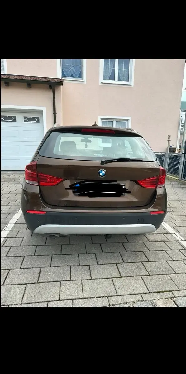 Używany BMW X1 177 KM (130 kW) 2012 Brązowy SUV