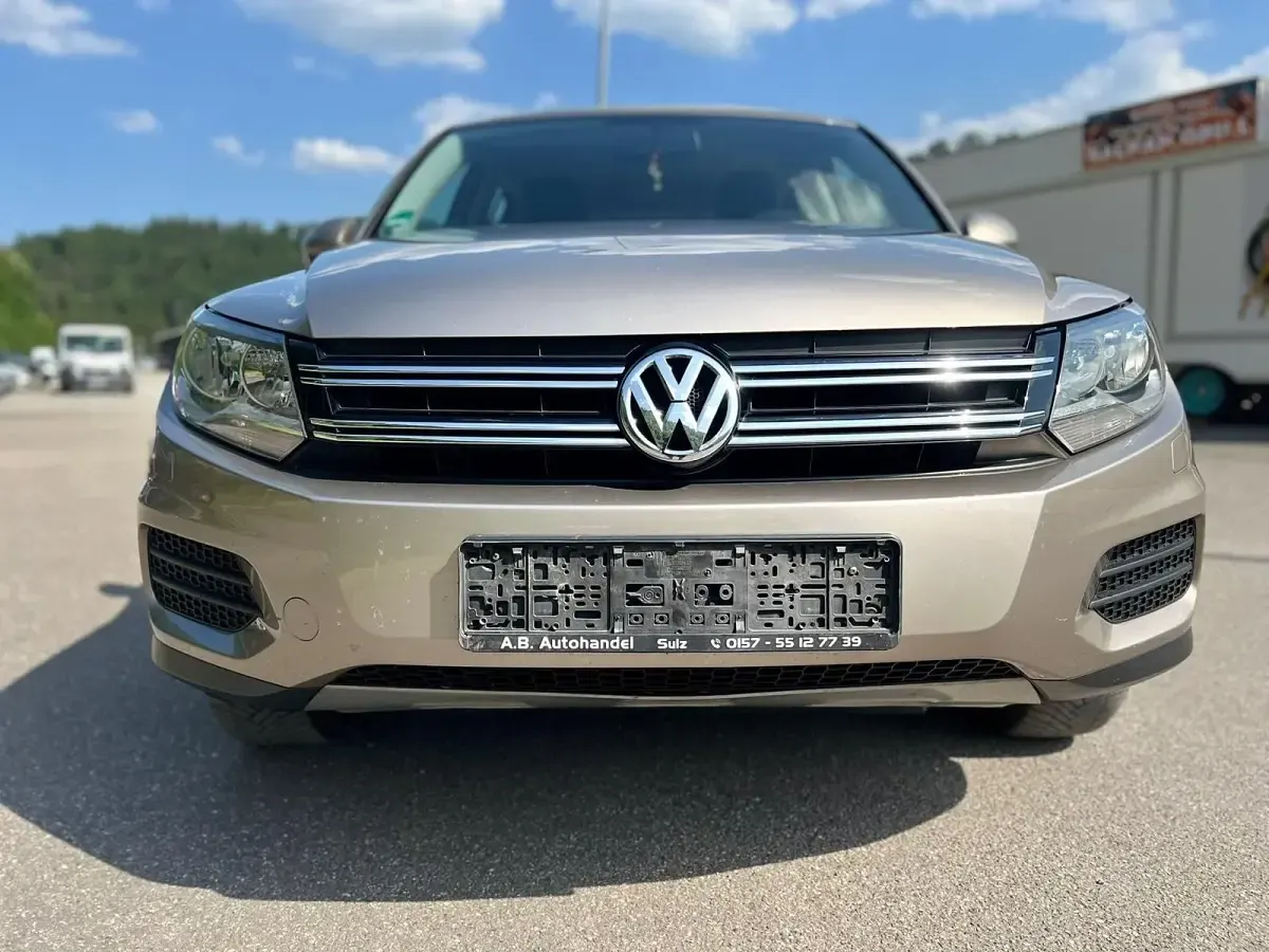 Używany VW Tiguan 179 KM (131 kW) 2012 Złoty SUV
