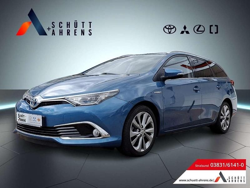 Blue metallic Gebraucht 2017 Toyota Auris Hybrid Basis Kombi | 15.890 € (Fairer Preis) - Bild 1/4