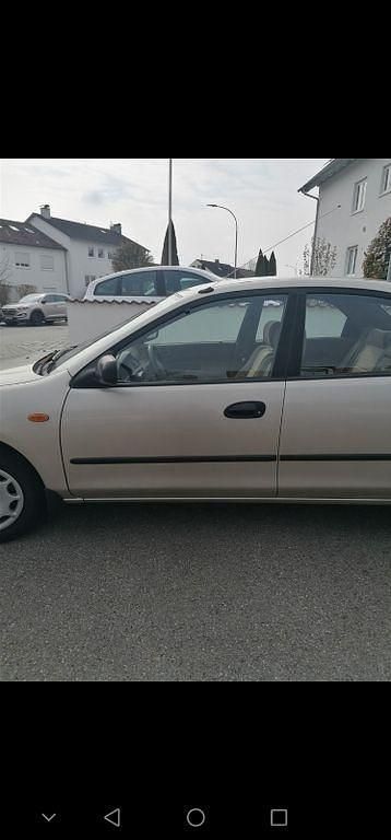 Gebraucht Mazda 323S 88 PS (64 kW) 1996 Beige Limousine