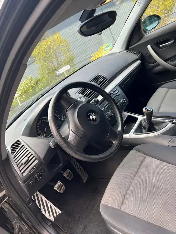 Second-hand BMW 116 116 CP (85 kW) 2006 Negru Hatchback