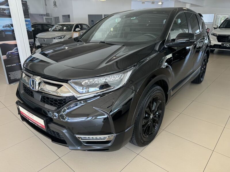 Dunkel schwarz metallic Gebraucht 2021 Honda CR-V Hybrid SUV | 27.990 € (Fairer Preis) - Bild 1/4