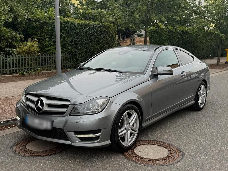 Grau Gebraucht 2013 Mercedes C220 AMG line Coupé | 9.500 € (Guter Preis) - Bild 1/4