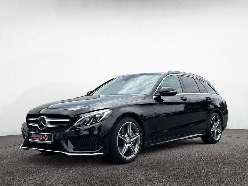 Obsidianschwarz metalliclack (metallic) Gebraucht 2016 Mercedes C300 AMG Kombi | 23.990 € (Fairer Preis) - Bild 1/4