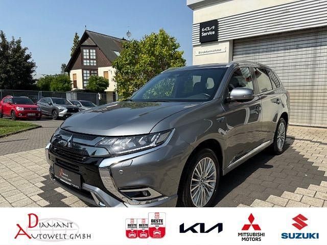Platinumgrau (m) Gebraucht 2020 Mitsubishi Outlander P-HEV Top SUV | 24.900 € (Fairer Preis) - Bild 1/4