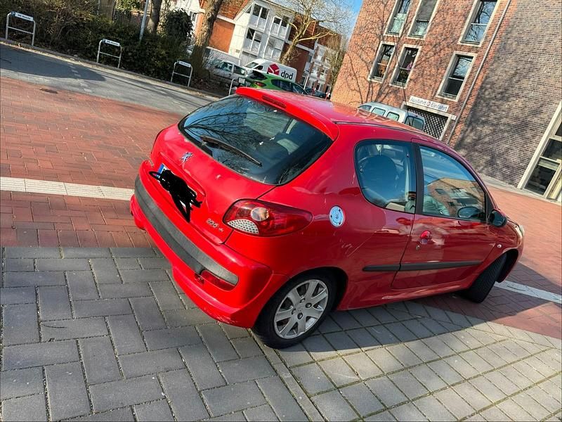 Gebraucht Peugeot 206+ 68 PS (50 kW) 2010 Rot Kleinwagen
