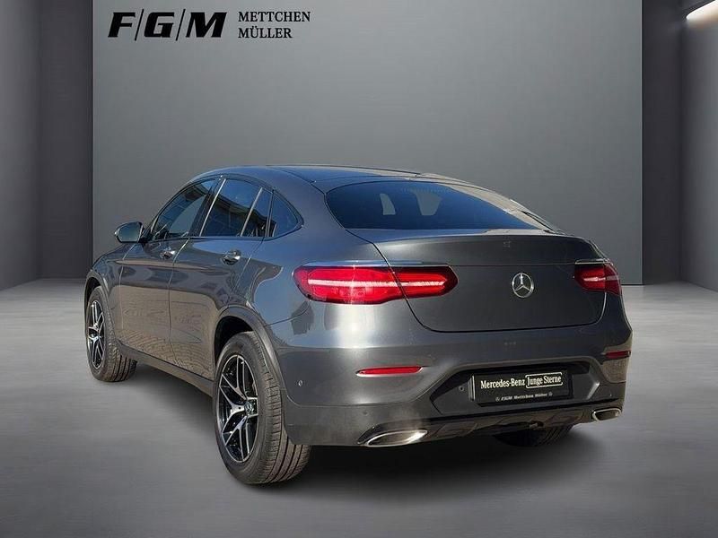 Gebraucht Mercedes GLC250 AMG line 211 PS (155 kW) 2019 Metalliclack selenitgrau Coupé