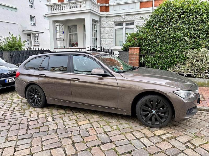 Braun Gebraucht 2014 BMW 318 Kombi | 6.199 € - Bild 1/4