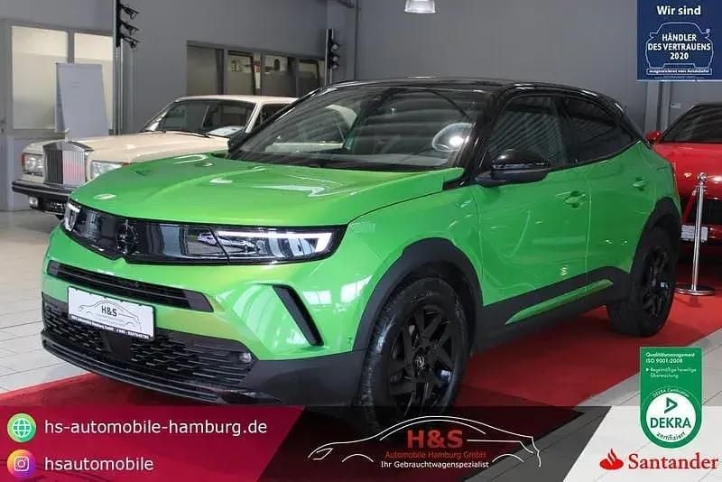 Matcha green/ikone gruen Gebraucht 2023 Opel Mokka GS Line SUV | 17.900 € (Superpreis) - Bild 1/4