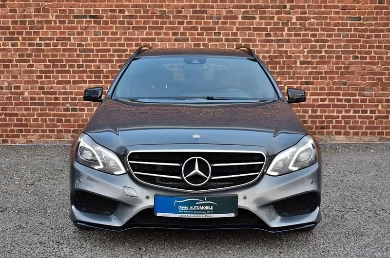 Gebraucht Mercedes E220 AMG line 163 PS (119 kW) 2016 Selenitgrau  metalliclack Kombi