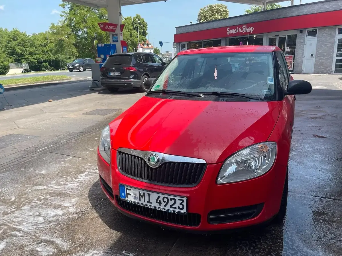 Używany Skoda Fabia 69 KM (50 kW) 2011 Czerwony Kombi