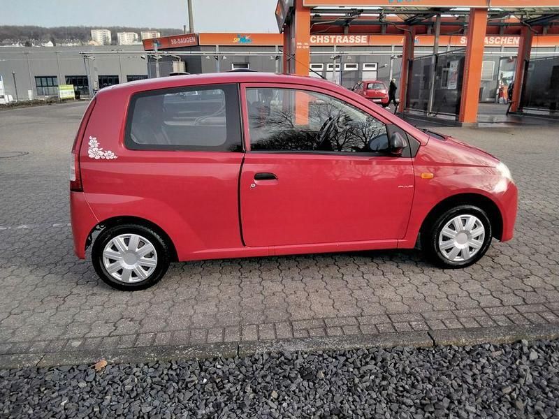 Gebraucht Daihatsu Cuore Plus 58 PS (42 kW) 2006 Rot Kleinwagen