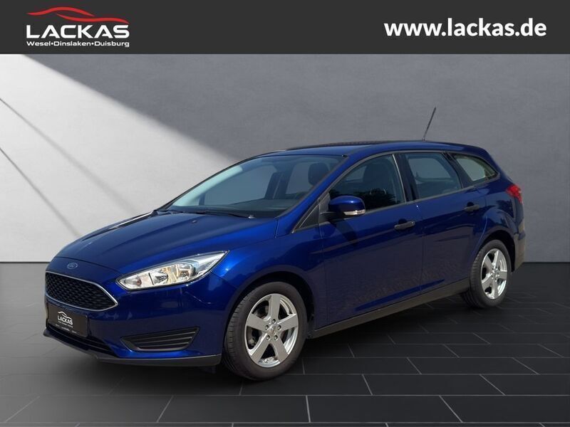 Blau Gebraucht 2015 Ford Focus Ambiente Limousine | 7.950 € (Fairer Preis) - Bild 1/4