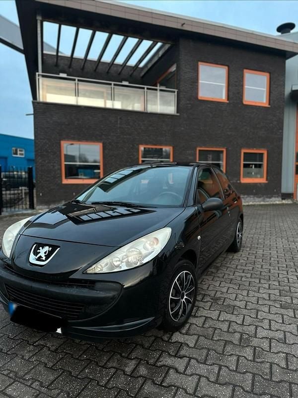 Gebraucht Peugeot 206+ 68 PS (50 kW) 2011 Schwarz Kleinwagen