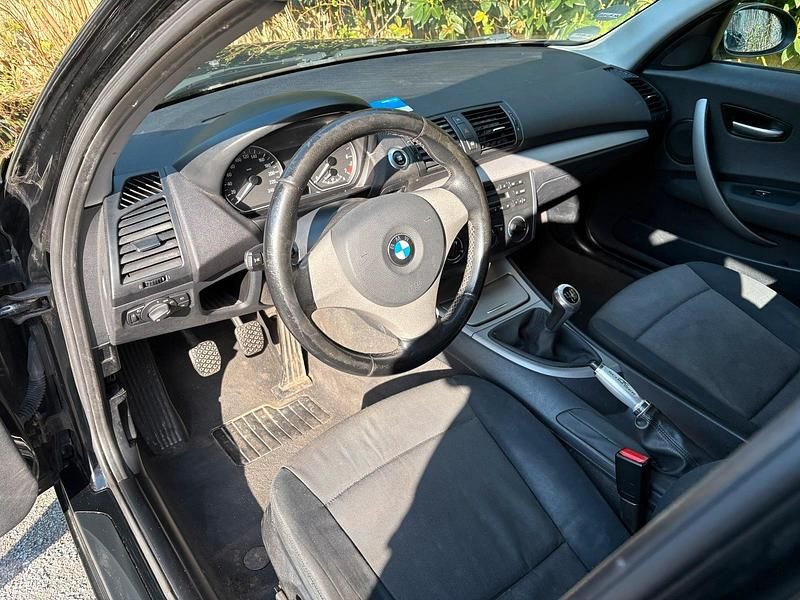 Second-hand BMW 116 115 CP (84 kW) 2006 Negru Hatchback