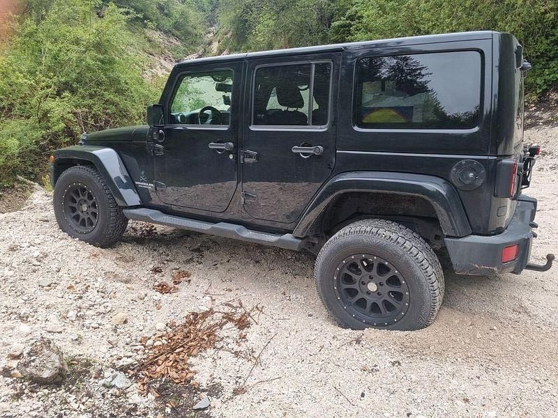 Schwarz Gebraucht 2012 Jeep Wrangler Sahara SUV | 22.999 € (Superpreis) - Bild 1/4
