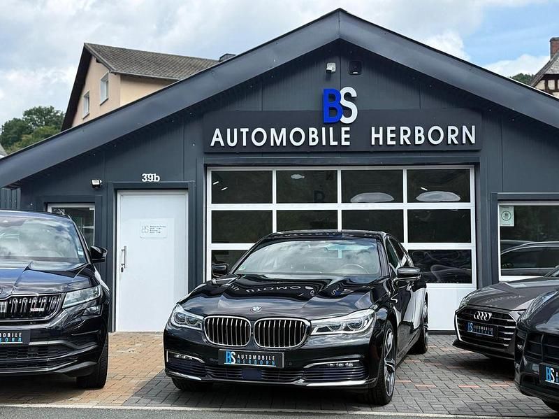 Schwarz Gebraucht 2015 BMW 730 Performance Limousine | 24.790 € (Fairer Preis) - Bild 1/4