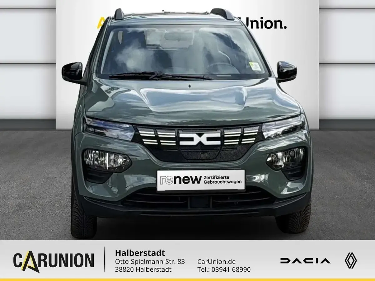 Gebraucht Dacia Spring Essentiel 33 kW (45 PS) 2023 Olivgrau Kleinwagen