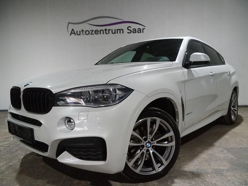 Mineralweiss metallic Gebraucht 2016 BMW X6 Sport Line SUV | 29.840 € (Fairer Preis) - Bild 1/4