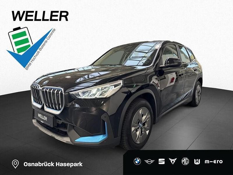 Schwarz ii (schwarz) Gebraucht 2023 BMW iX1 Comfort Edition SUV | 36.450 € (Superpreis) - Bild 1/3